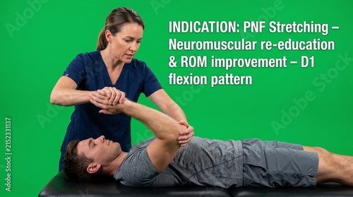 Physiotherapist performs PNF stretching for neuromuscular re-education and hip ROM improvement