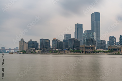 The skyline of modern urban architecture in Shanghai, China, and the scenery of Yangpu Bridge and Huangpu River