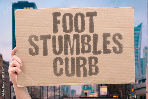 Bild auf Leinwand "Foot stumbles curb" Your toe catches the edge of the sidewalk