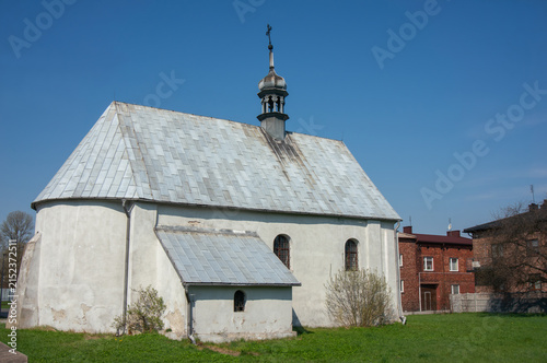 Church of Saint Barbara and Saint Valentine (kościół świętej Barbary i świętego Walentego), single-nave building, gabled roof, topped by bell-tower. Siewierz, Poland.