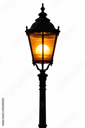 Classic street lamp with a glowing sun inside isolated on white background