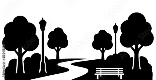 Silhouette of a park with trees, a winding path, street lamps, and a bench