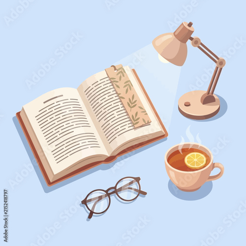 Open book with desk lamp tea and glasses