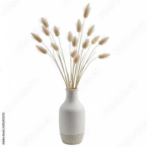 Dried bunny tail grass in a white ceramic vase
