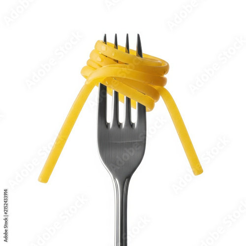 Fresh spaghetti pasta wrapped around a silver metal fork