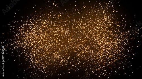 Vibrant golden sparks scatter on a dark background. Concept of energy, celebration, and festive atmosphere, ideal for marketing, overlay, design, and advertising. Generative AI.