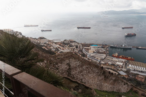 Panoramic high angle view of the Bay of Gibraltar, harbor, and cityscape from the Rock of Gibraltar
