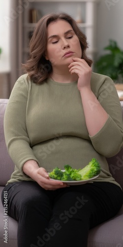 Plus size woman thinking about healthy food and dieting