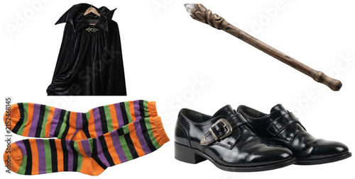 Canvas Print A set of classic witch costume pieces including shoes, cloak, stockings, and a magic wand