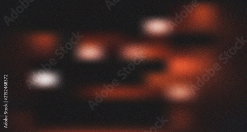 Fotografie Warm glowing orange and red light patches creating a fiery abstract visual with