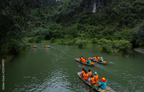 Boating in Ninh Binh (Vietnam) along the winding emerald river
