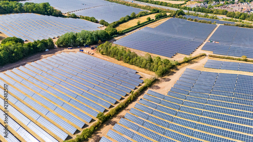 Aerial view of a large scale solar farm generating renewable energy in the UK