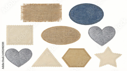 Assorted fabric patches with heart star and geometric shapes in neutral and denim colors on transparent background