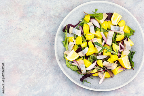 Canvastavla Salted herring salad with potatoes and mixed greens