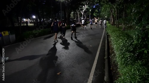 Asians jogging in city public park