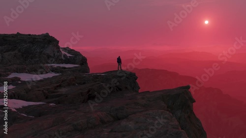Man Standing on Cliff Edge at Sunset with Majestic Pink Sky - A 3D Rendered Mountain Landscape