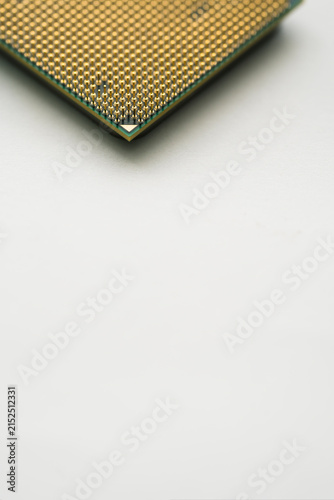 Gold contact pins of a computer CPU processor
