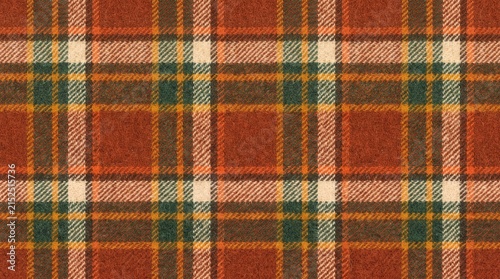 Red plaid fabric texture. Autumnal tartan pattern for textile design and cozy backgrounds.