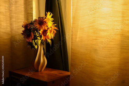 still life with yellow flowers