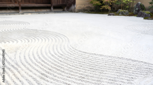 Japanese Zen Garden with Raked White Gravel and Curved Patterns