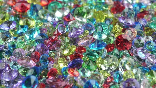 Colorful Sparkling Gemstones Background with Shining Crystal Diamonds.