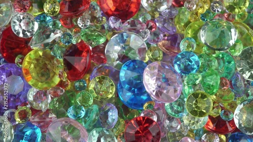 Colorful Sparkling Gemstones Background with Shining Crystal Diamonds.
