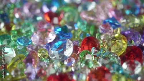 Colorful Sparkling Gemstones Background with Shining Crystal Diamonds.