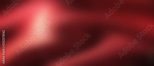 Crimson red silk fabric background with elegant soft waves. Luxurious satin texture with smooth light gradients. Deep ruby textile backdrop for romantic fashion and premium product marketing.