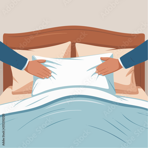 Two peoples hands carefully adjust a fluffy white pillow on a neatly made bed, ready for a restful night's sleep.