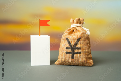 Obraz na płótnie Yen or yuan money bag and flag symbolize the goal to be achieved