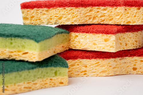 Close-up of kitchen cleaning sponges with abrasive scouring pads.