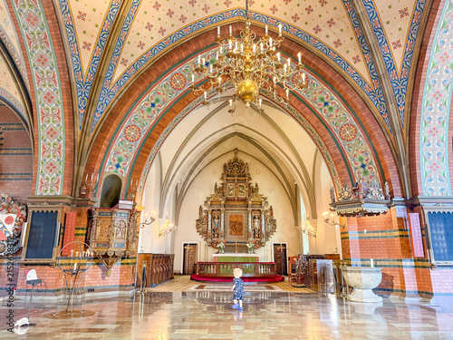Bild auf Leinwand Painted vaults and golden altar inside Trelleborg church