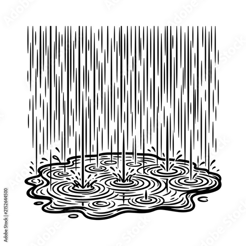 Heavy Rain Falling Creating Ripples in Puddle.