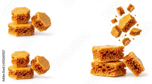 Crunchy honeycomb toffee pieces falling in the air