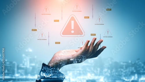 Bild auf Leinwand Digital hand holding warning symbols over a city skyline with a futuristic theme showcasing technology and alert notifications