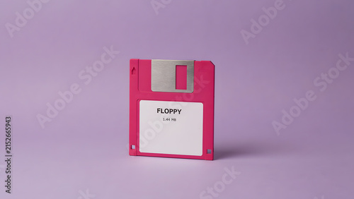 Clean Contemporary Graphic of Iconic Pink Floppy Disk with Brushed Metal Details