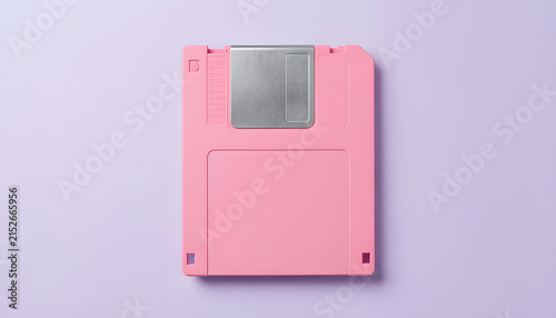 Vibrant Royal Pink Floppy Disk on Lavender Background with Retro Pop-Art Aesthetic