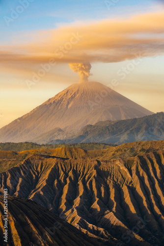 Scenery view of Mount Semeru volcano, Indonesia's highest and most active volcano on Java, frequently emits smoke, ash, and steam plumes.