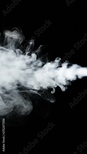 Abstract white smoke billows and swirls dynamically against a solid black background