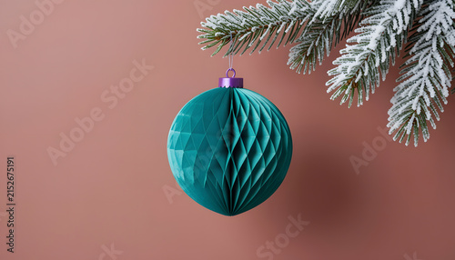 Festive Winter Scene Featuring Layered Paper Ornament and Snowy Spruce Detail