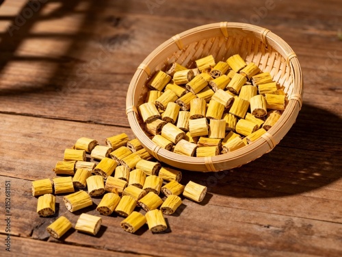 Dried Longan in Bamboo Basket on Wooden Tray