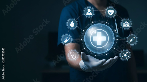 Doctor holding digital healthcare network cross icon concept futuristic care