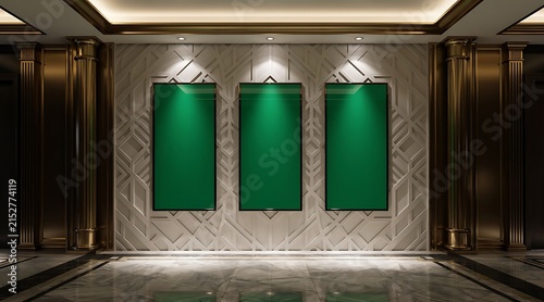 Three empty green display boards mounted on a textured wall with spotlights.