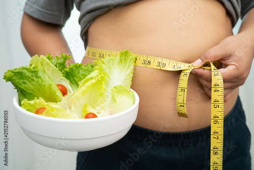 Canvastavla Asian woman with fat belly big size overweight and obesity with healthy food