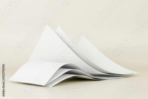 Stack of white paper sheets with curved edges creating abstract shapes on a light beige background, for minimalist office, stationery concepts
