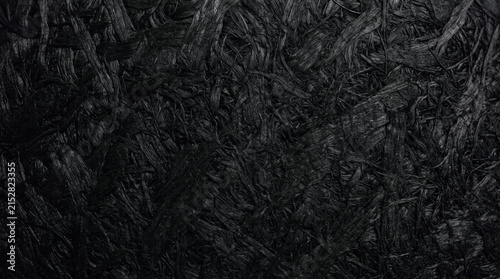 Black OSB Wood Texture Background, Dark Oriented Strand Board Surface Pattern