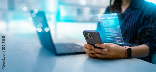 User giving privacy consent on smartphone screen with GDPR interface,highlighting data protection,terms and conditions agreement,legal regulations and digital information compliance.