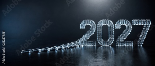 2027 new year made of transparent dominoes on dark background