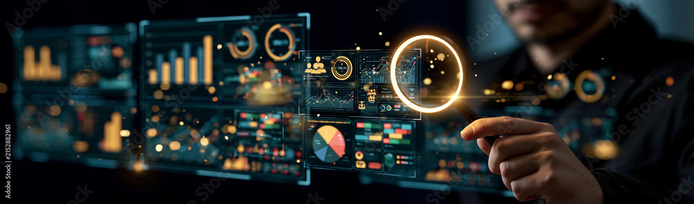 Fototapeta premium Data Visualization Interface: A man interacts with a futuristic holographic display showing complex data charts and graphs, symbolizing digital information and analysis.