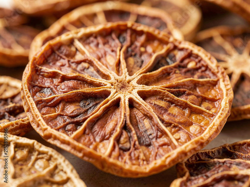 dry oranges slices on a black background